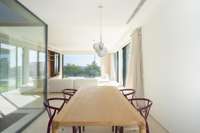 living - Nueva promoción de villas en Santa Eulalia con vistas al mar y piscinas privadas - gallery thumbnail - 9