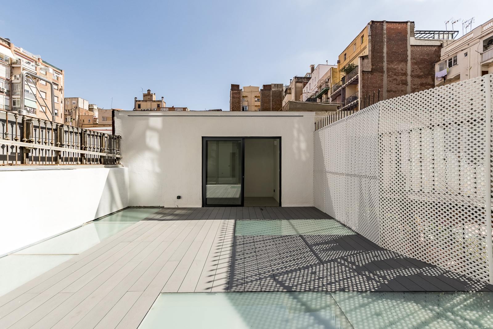 living - Piso de 140m² con 27m² terraza en venta en Eixample Izquierdo - gallery thumbnail - 5