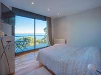 living - Excelente villa moderna en venta a 1,5 km de Lloret de Mar - gallery thumbnail - 7