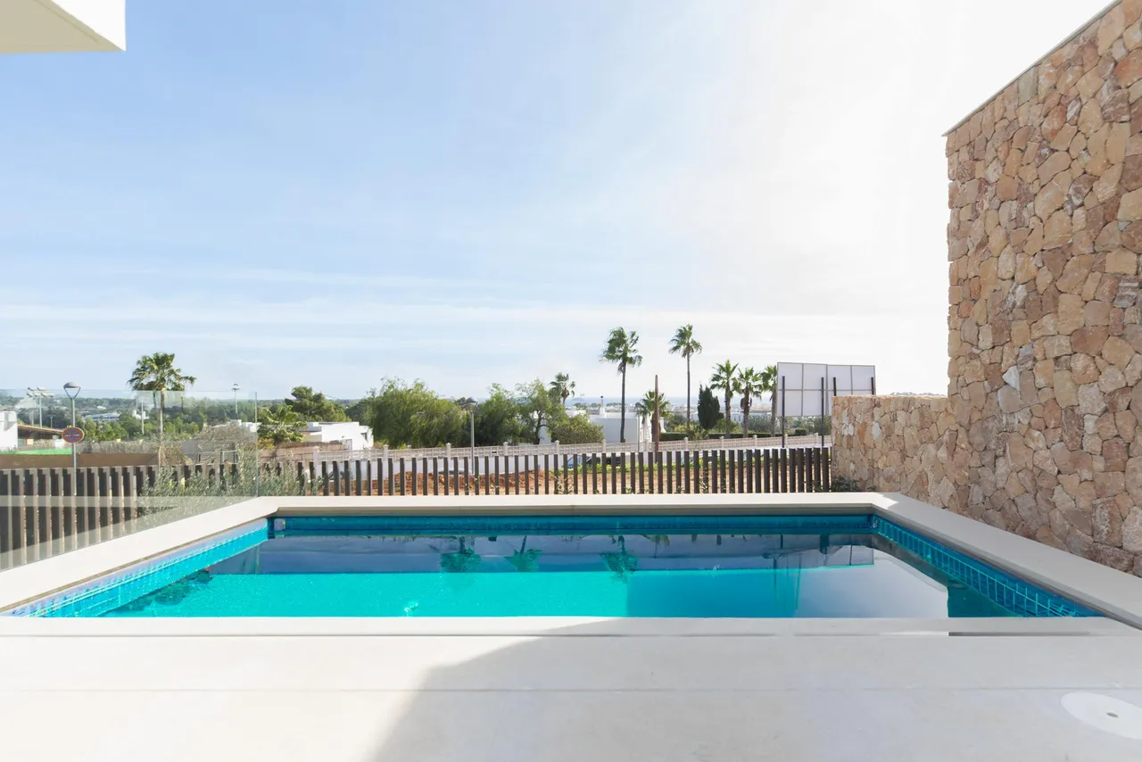 living - Nueva promoción de villas en Santa Eulalia con vistas al mar y piscinas privadas - gallery - 2
