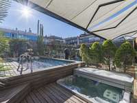 living - Piso de 542m² con 189m² terraza en venta en Eixample Derecho - gallery thumbnail - 1