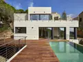 living - Villa moderna recién construida en venta en Cala Canyelles - gallery thumbnail - 1