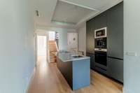 living - Ático de 166m² en venta en Pacífico, Madrid - gallery thumbnail - 10