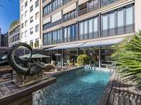 living - Piso de 542m² con 189m² terraza en venta en Eixample Derecho - gallery thumbnail - 2
