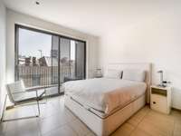 living - Ático de 74m² con 40m² terraza en venta en Poblenou - gallery thumbnail - 6