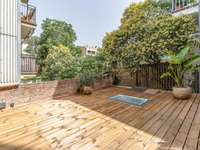 living - 79m² apartment with 33m² terrace for sale in Gràcia - gallery thumbnail - 1