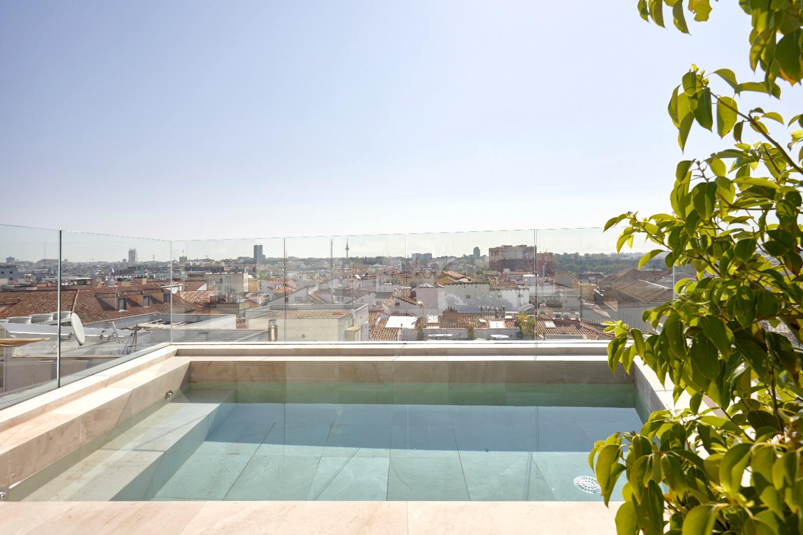 living - 600m² penthouse for rent in Cortes / Huertas, Madrid - gallery thumbnail - 1