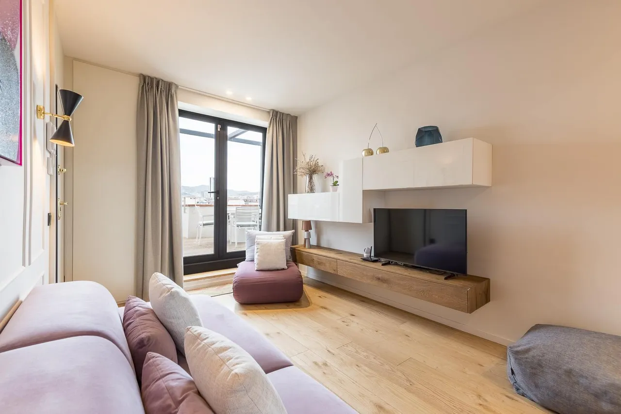 living - Ático de 50m² con 53m² terraza en venta en Eixample Izquierdo - gallery - 8
