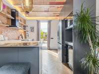 living - Ático de 52m² con 62m² terraza en venta en Eixample Derecho - gallery thumbnail - 10