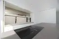 living - Nueva promoción de villas en Santa Eulalia con vistas al mar y piscinas privadas - gallery thumbnail - 10