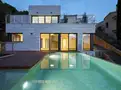 living - Villa moderna recién construida en venta en Cala Canyelles - gallery thumbnail - 5