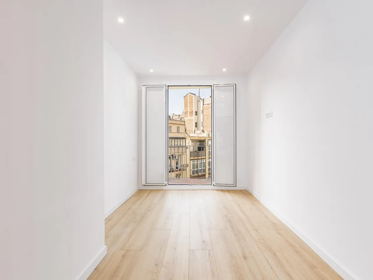 living - Piso de 80m² en venta en Eixample Izquierdo, Barcelona - gallery - 5