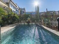 living - Piso de 542m² con 189m² terraza en venta en Eixample Derecho - gallery thumbnail - 3