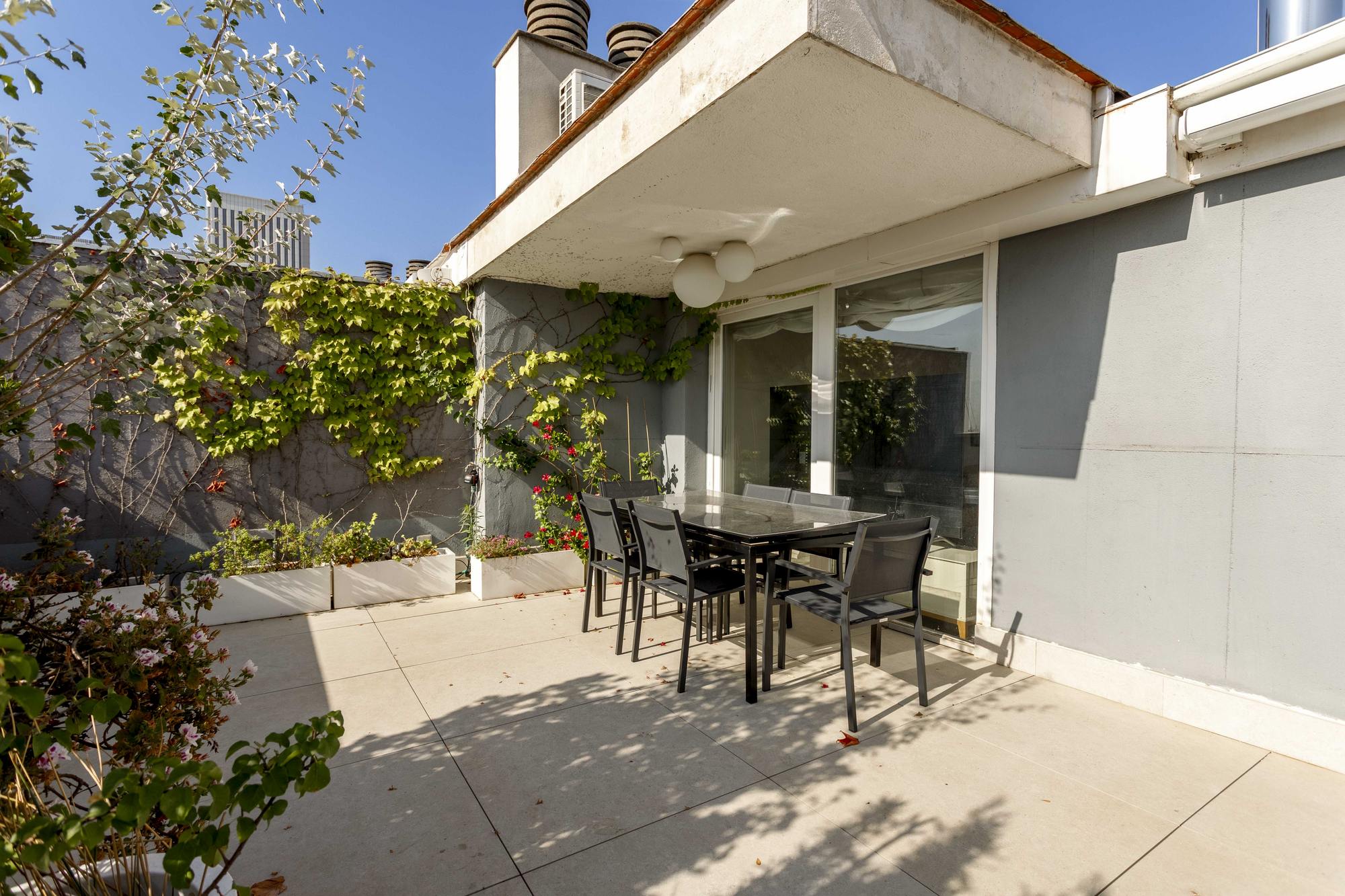 living - 250m² penthouse with 24m² terrace for rent in Cuatro Caminos - gallery thumbnail - 3