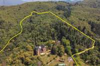 living - Castillo / palacio de 1,966m² en venta en La Selva, Girona - Plano del piso thumbnail - 1