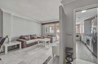 living - Piso de 118m² con 19m² terraza en venta en Milla de Oro - gallery thumbnail - 3