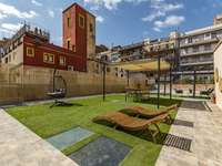 living - Piso de 147m² con 395m² terraza en venta en Eixample Izquierdo - gallery thumbnail - 1