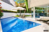 living - Piso de 560m² con 300m² de jardín en venta en Conde de Orgaz y Piovera - gallery thumbnail - 2
