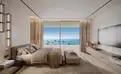living - Contemporary sea-front homes in Estepona with panoramic Mediterranean views, rooftop infinity pool, wellness spa and concierge services. - gallery thumbnail - 7